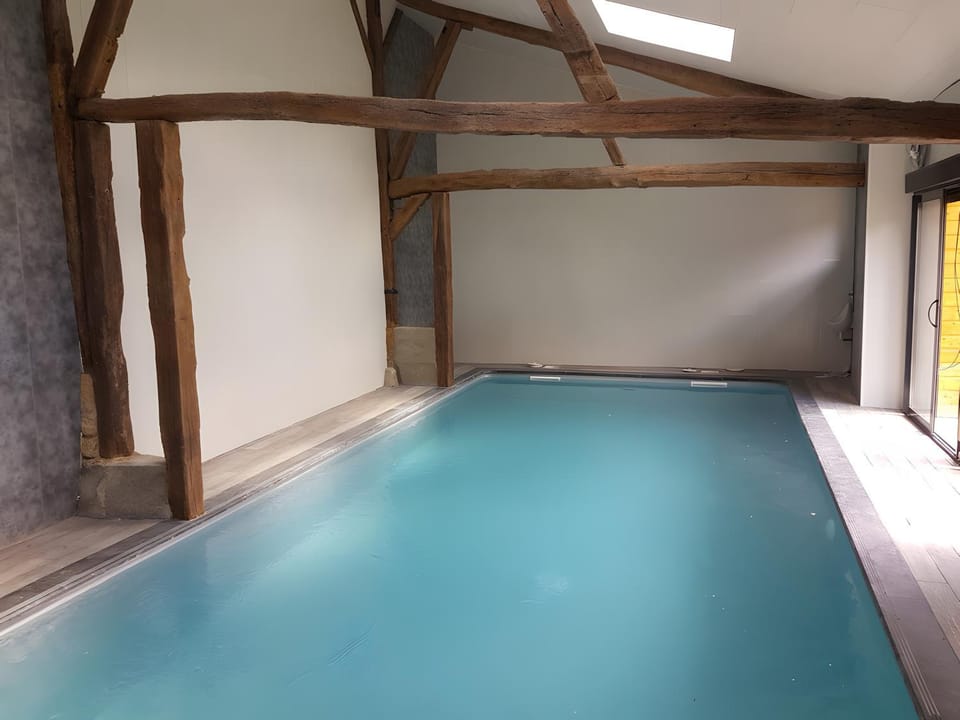 Property building, Living room, Swimming pool