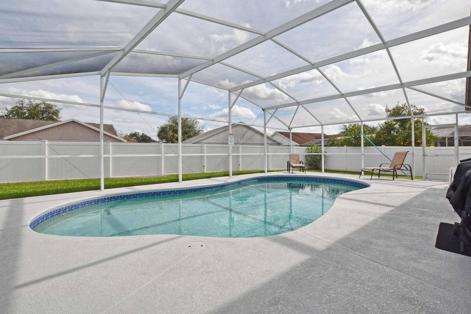 Best Value Near Disney! Private Pool, BBQ, Fenced Yard & Room for 8 House in Osceola County