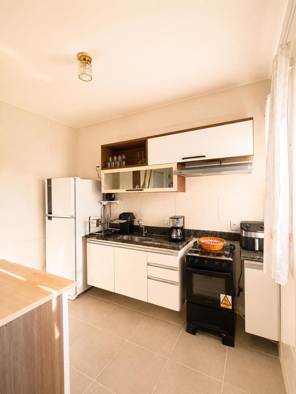 Kitchen or kitchenette, oven, stove, toaster