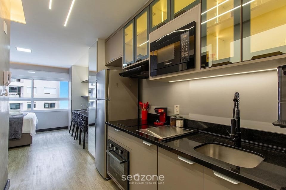 View (from property/room), Kitchen or kitchenette, Seating area, Bedroom