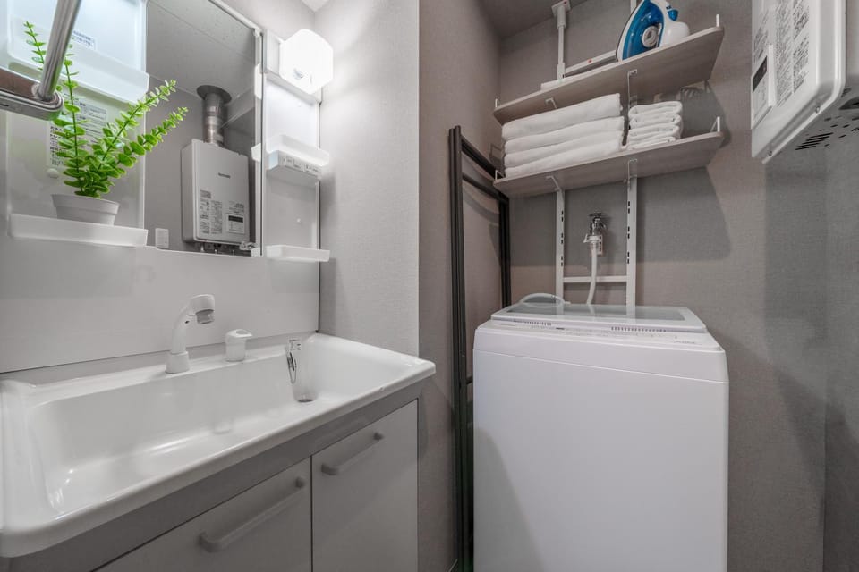 flat iron, towels, washing machine