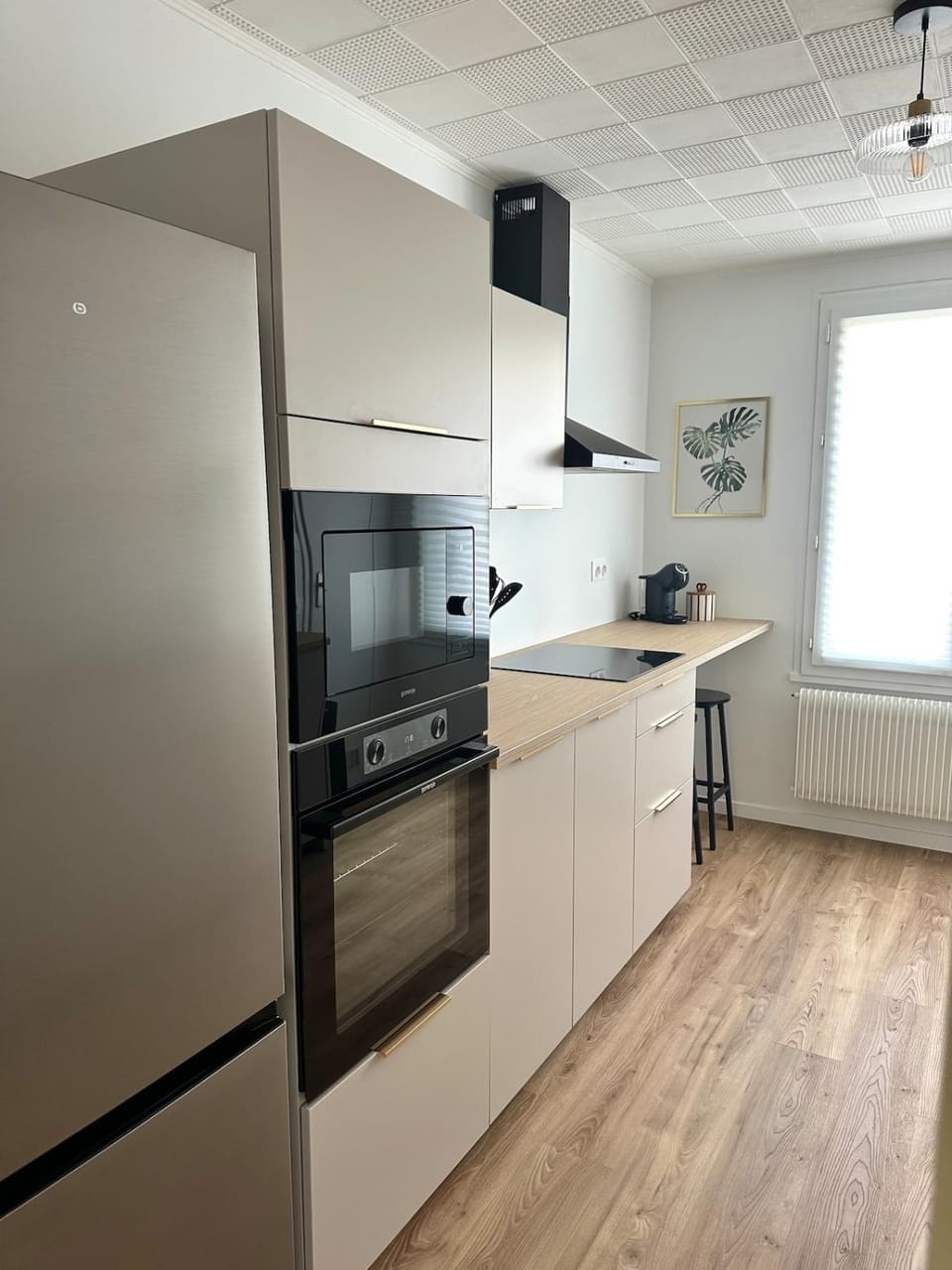Kitchen or kitchenette, dishwasher, microwave, oven, stove