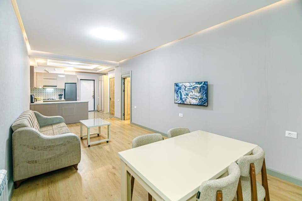 TV and multimedia, Kitchen or kitchenette, Living room, Seating area, Dining area