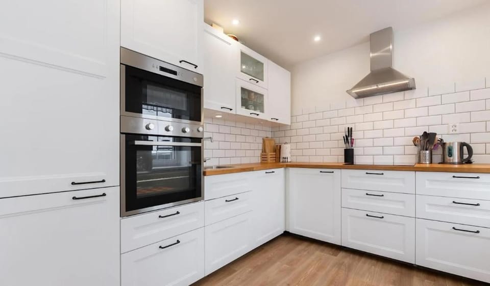 Kitchen or kitchenette, dishwasher, oven, stove, toaster