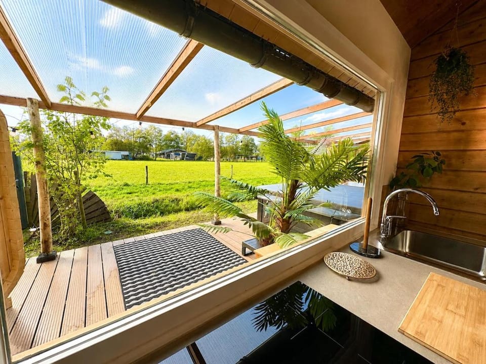 Bohemian style house with private jacuzzi and sauna and free parking near Amsterdam and Airport House in Haarlem