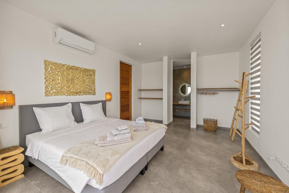 Bed, Bedroom, towels, wardrobe, air conditioner