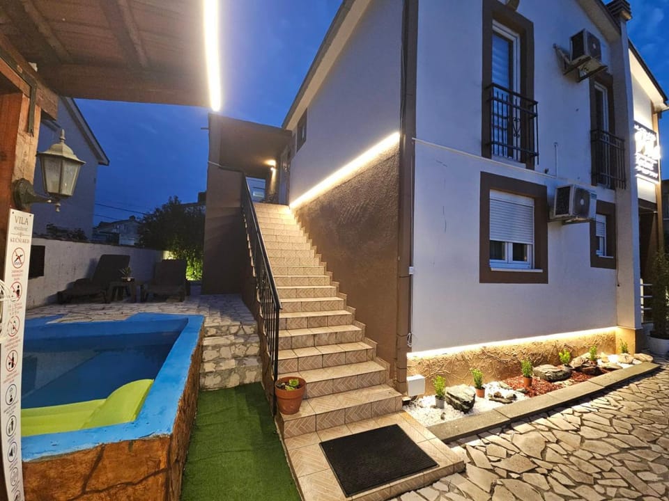 Property building, Patio, Night, Swimming pool