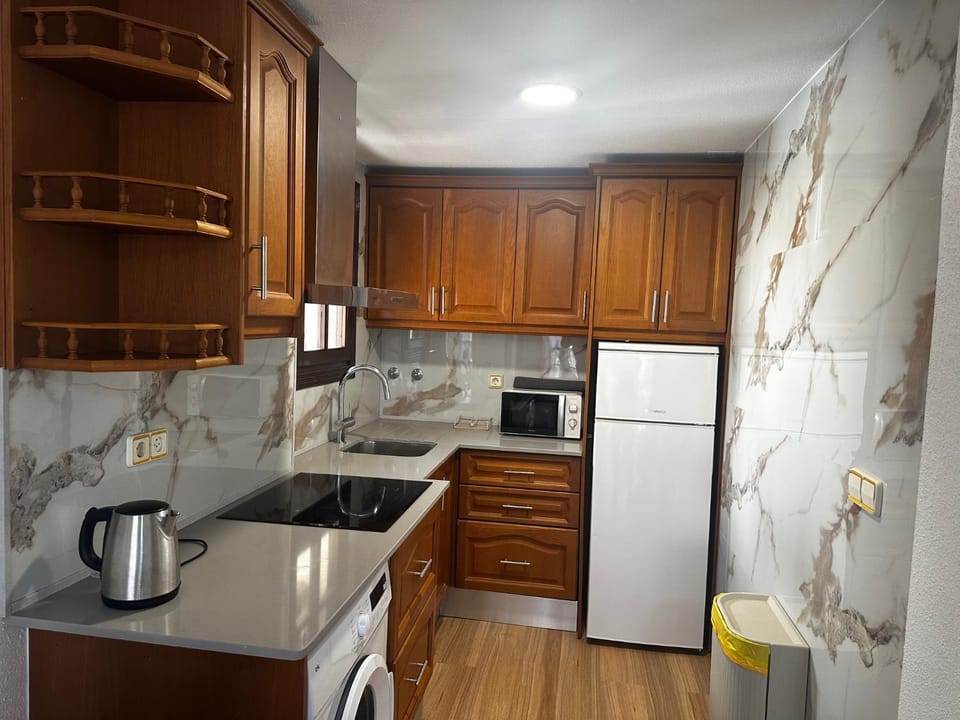Kitchen or kitchenette, microwave, washing machine