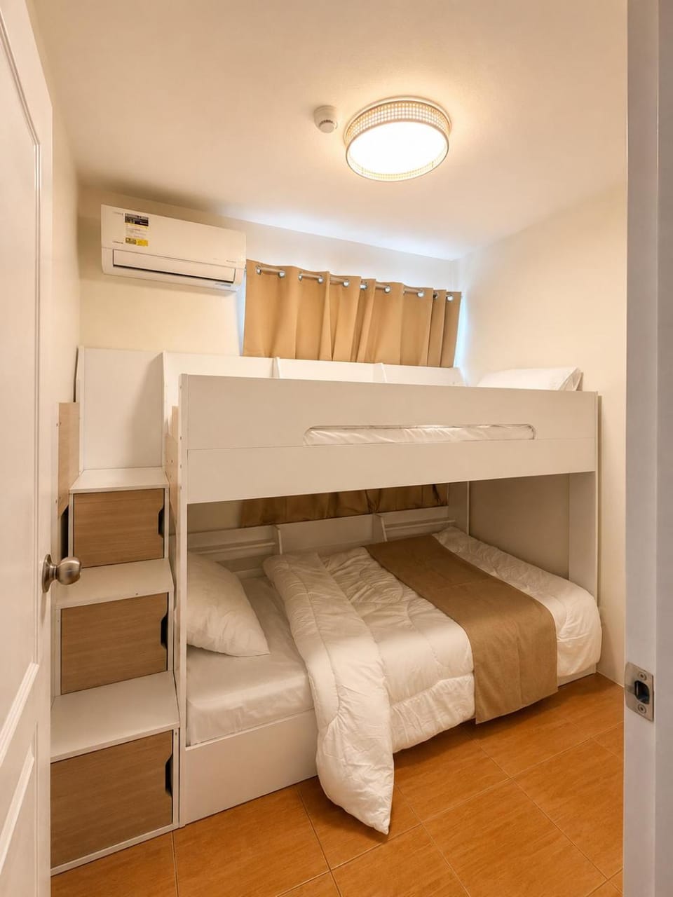 Photo of the whole room, bunk bed, air conditioner