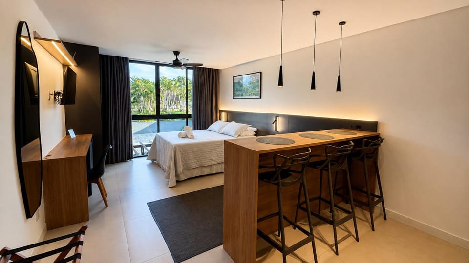 Bed, TV and multimedia, Kitchen or kitchenette, Living room, Photo of the whole room, Seating area, Dining area, Bedroom, towels