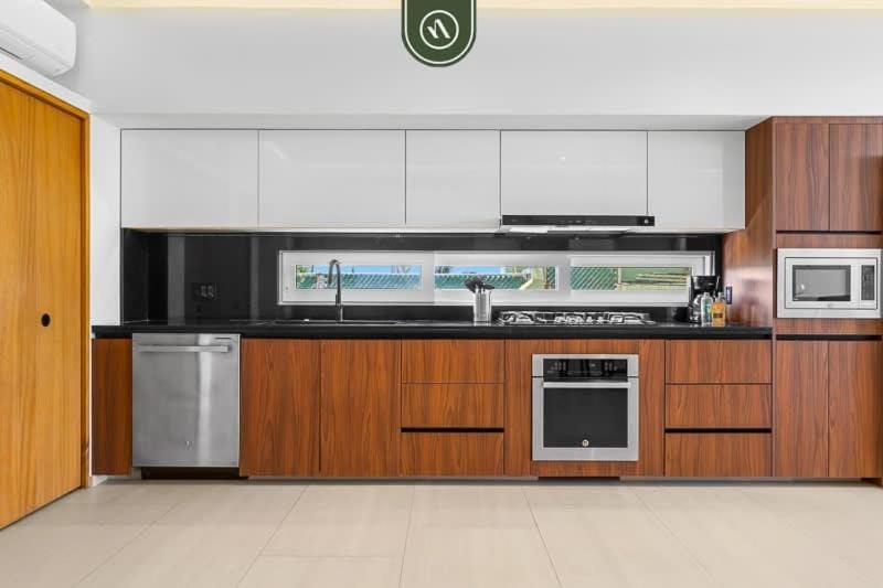 Kitchen or kitchenette, dishwasher, oven, stove, kitchen