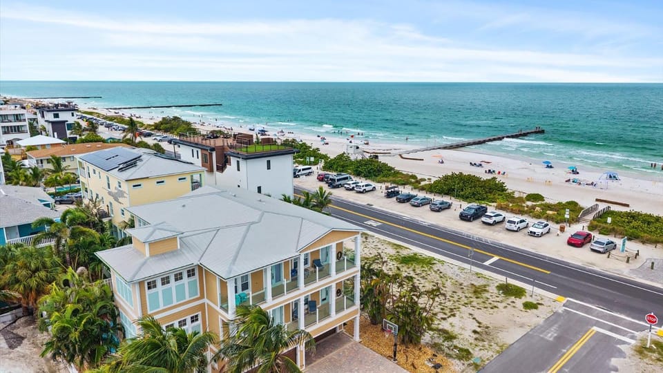 Beachview balconies with pool steps from the beach House in Bradenton Beach