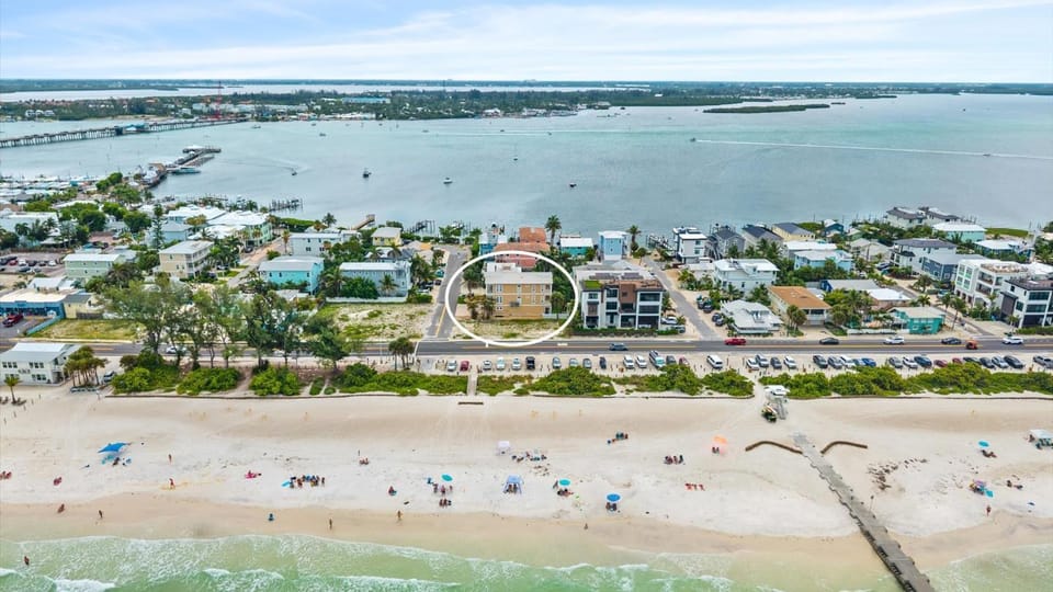 Beachview balconies with pool steps from the beach House in Bradenton Beach