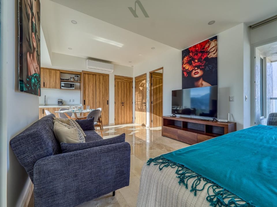 Bed, TV and multimedia, Kitchen or kitchenette, Living room, Seating area
