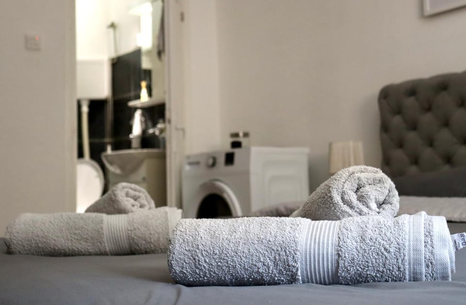 Bed, towels, laundry