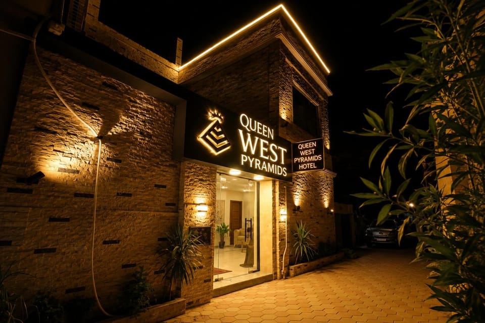 Property building, Night, Property logo or sign, Logo/Certificate/Sign, Text overlay, Street view, Certificate/Award
