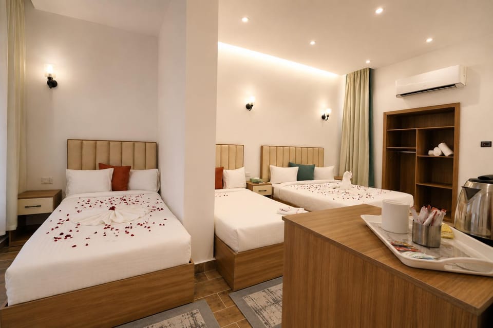 Bed, Photo of the whole room, Bedroom, towels, air conditioner