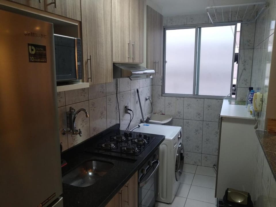 Kitchen or kitchenette, dishwasher, oven, stove, washing machine, dryer
