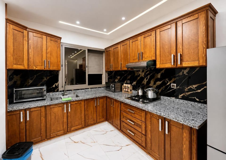 Kitchen or kitchenette, dishwasher, stove