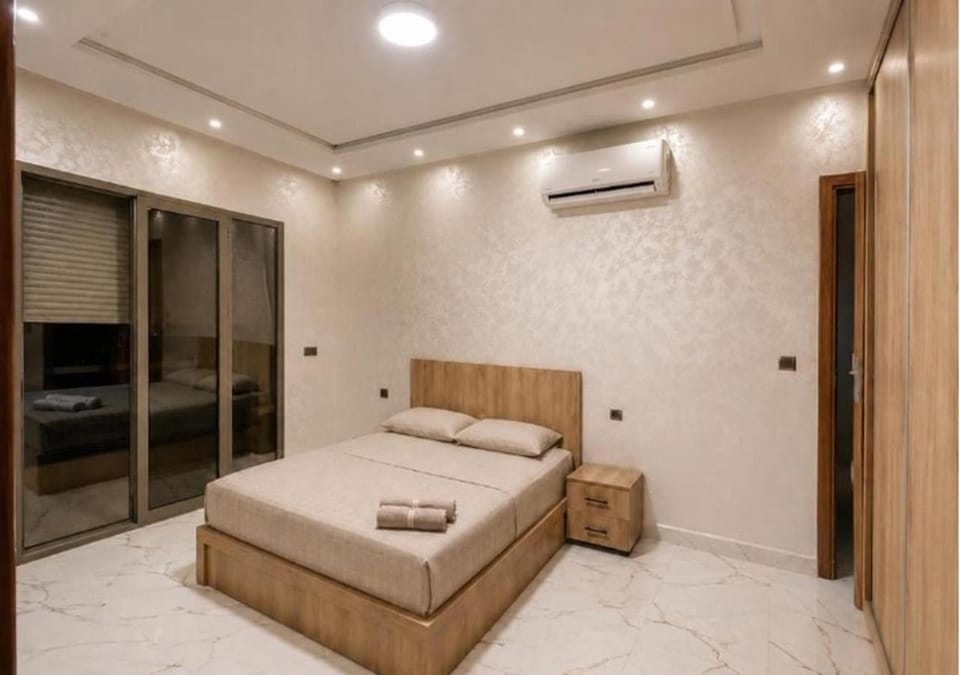 Bed, Photo of the whole room, Bedroom, towels, air conditioner