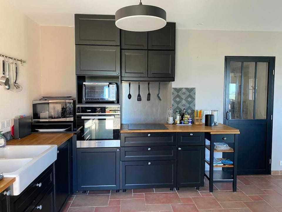 Kitchen or kitchenette, dishwasher, oven, stove, toaster