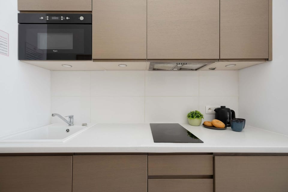 Kitchen or kitchenette, stove