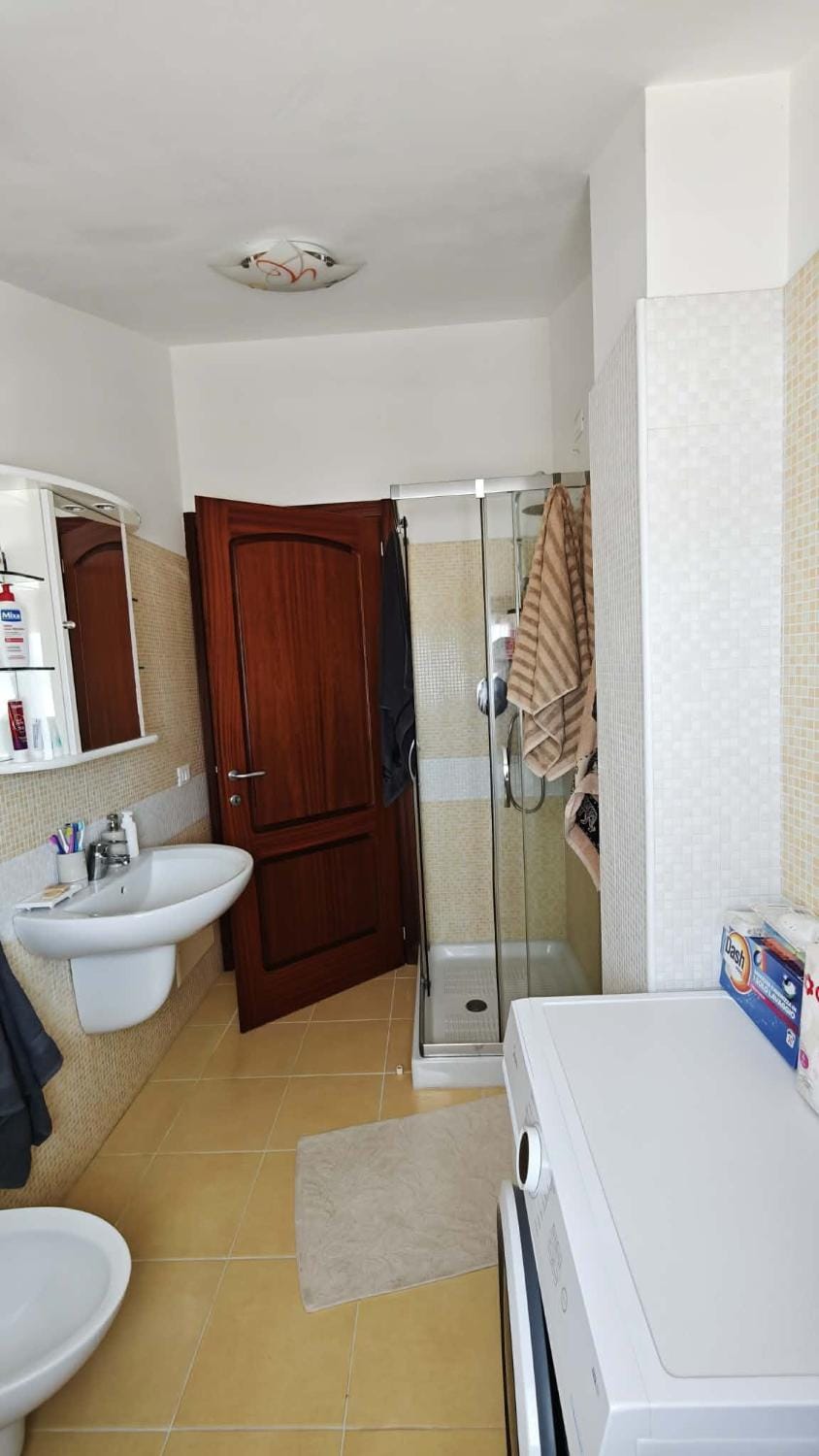 Shower, Toilet, Bathroom, bidet, towels, washing machine