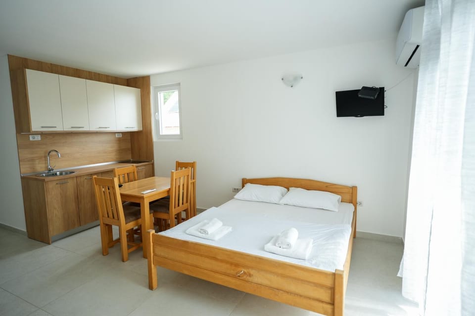 Bed, Kitchen or kitchenette, towels