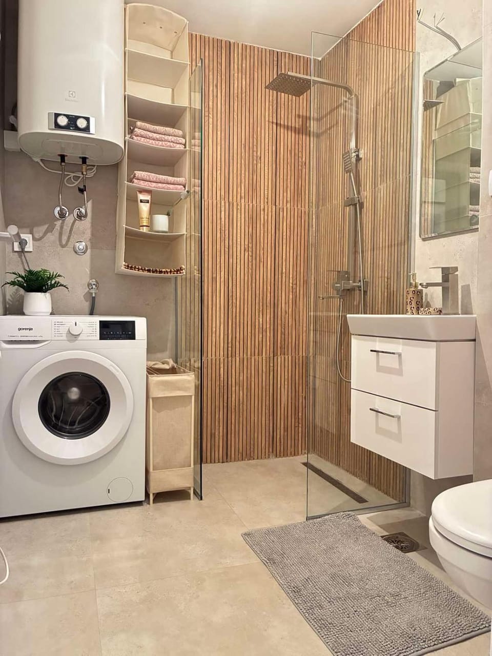Shower, Toilet, Bathroom, towels, washing machine, dryer
