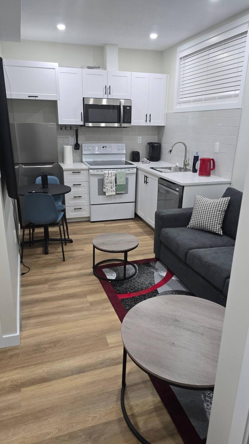 Living room, microwave, oven, kitchen