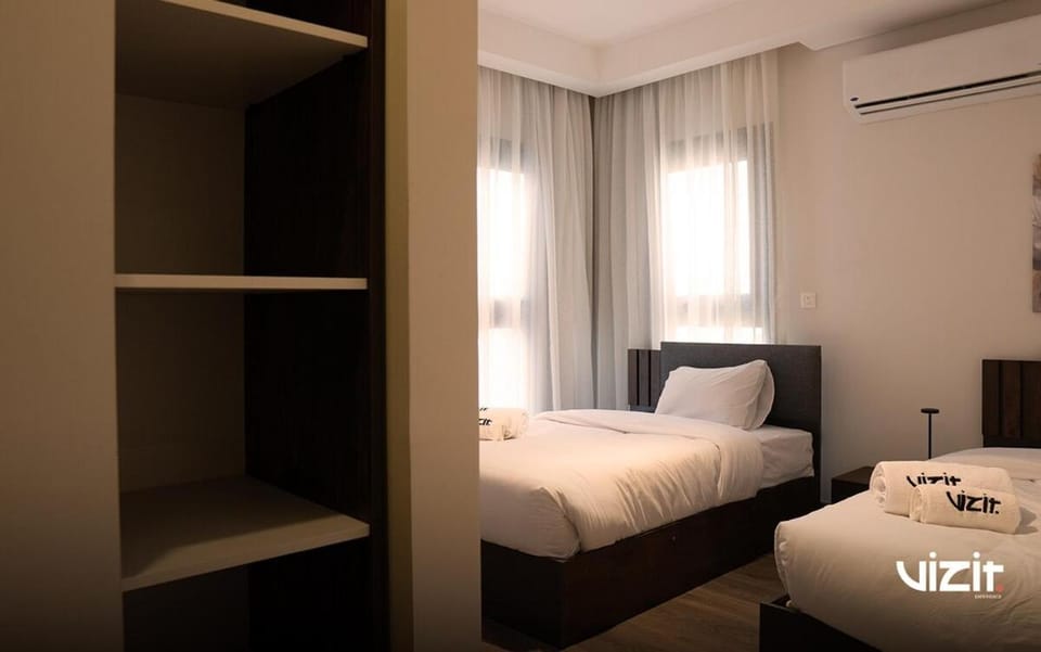 VIZIT 3BDR in Zed West Buildings Near Arkan Plaza Apartment in Egypt