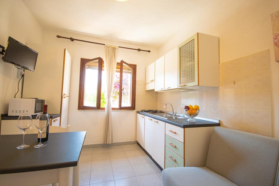 APT San Teodoro con Veranda, Parcheggio e Wi-Fi Apartment in Sardinia