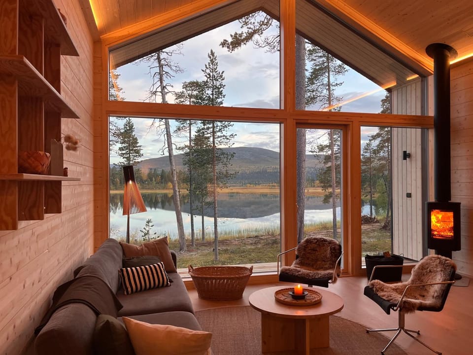Natural landscape, Living room, Seating area, Evening entertainment, Lake view, Mountain view, fireplace, fireplace