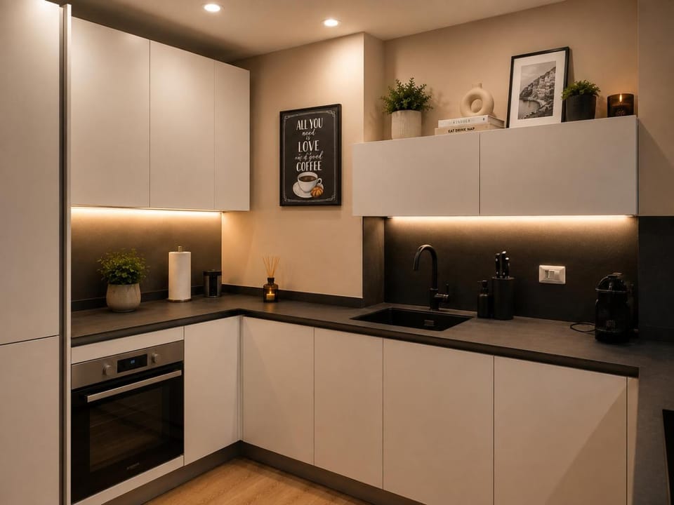 Kitchen or kitchenette, dishwasher, oven, stove