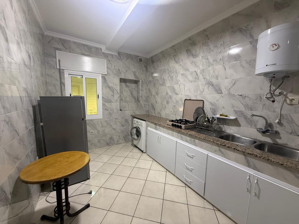 Kitchen or kitchenette, stove