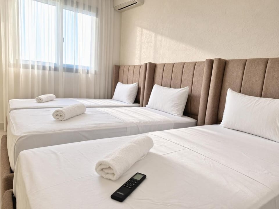 Bed, Photo of the whole room, Bedroom, towels, air conditioner