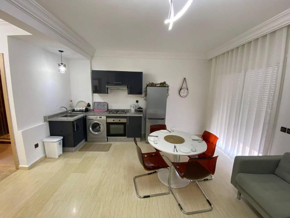 Kitchen or kitchenette, Living room, Seating area, Dining area