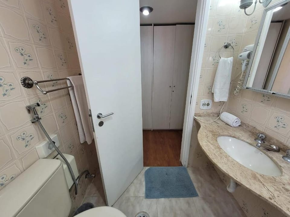 Shower, Toilet, Bathroom, hair dryier, towels