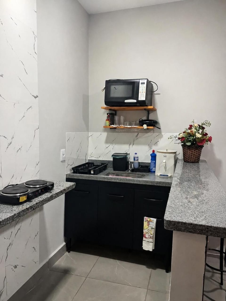 Kitchen or kitchenette, stove, toaster