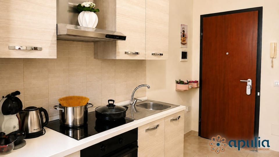 Kitchen or kitchenette, stove