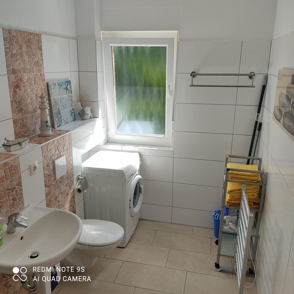 Shower, Toilet, Bathroom, towels, washing machine, dryer