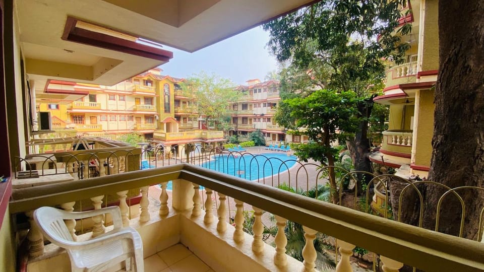 Property building, Patio, Day, Natural landscape, View (from property/room), Balcony/Terrace, Pool view, Swimming pool, sunbed