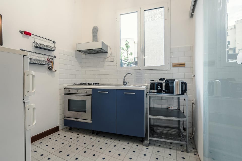Kitchen or kitchenette, oven, stove, toaster