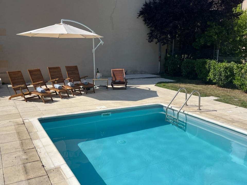 Property building, Living room, Swimming pool