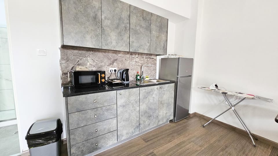 Kitchen or kitchenette, stove, toaster