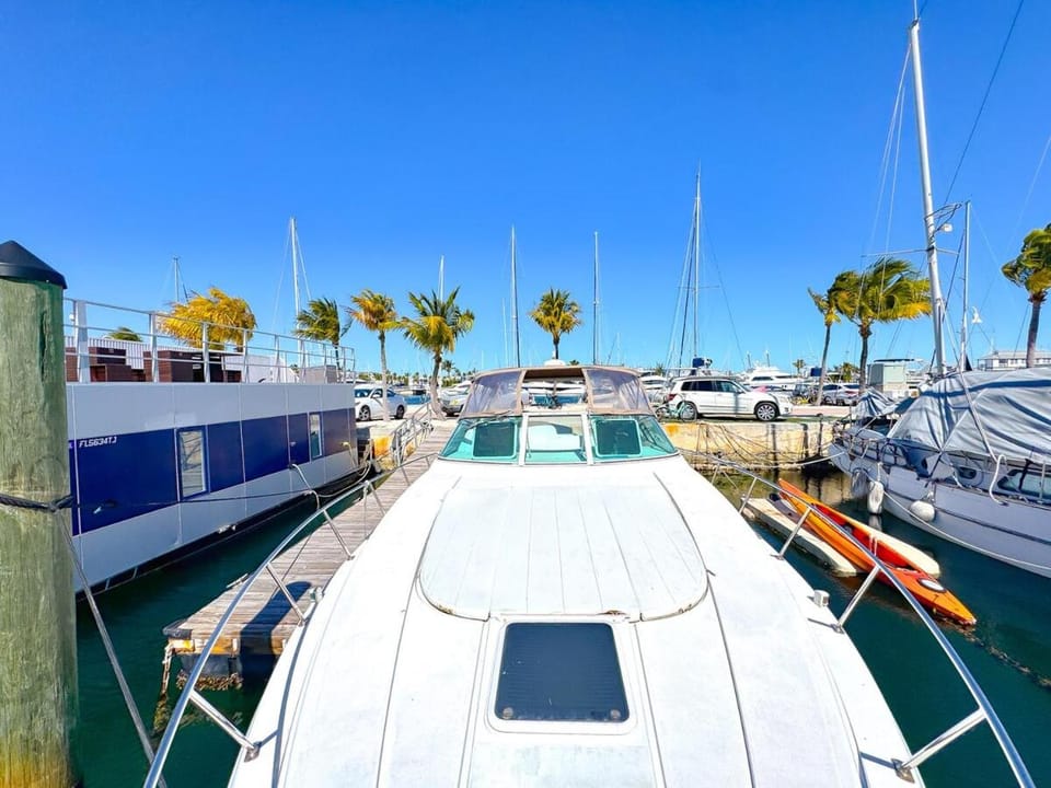 Waterfront Boat Stay & Resort Amenities Docked boat in Stock Island