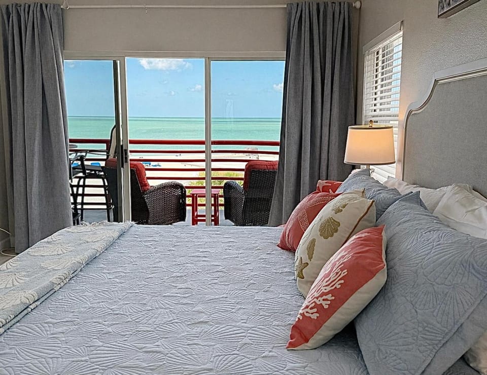 Upscale Beachfront Penthouse style 2bdr-2 bath - Oversize Gulf View Balcony - Walk to Dining & Shopping Apartment in Madeira Beach