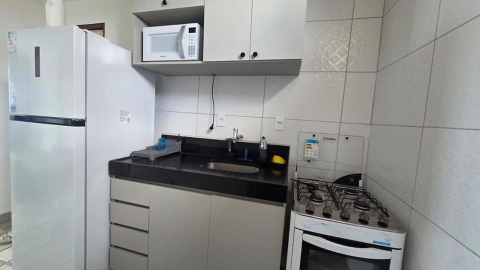 Kitchen or kitchenette, oven, stove