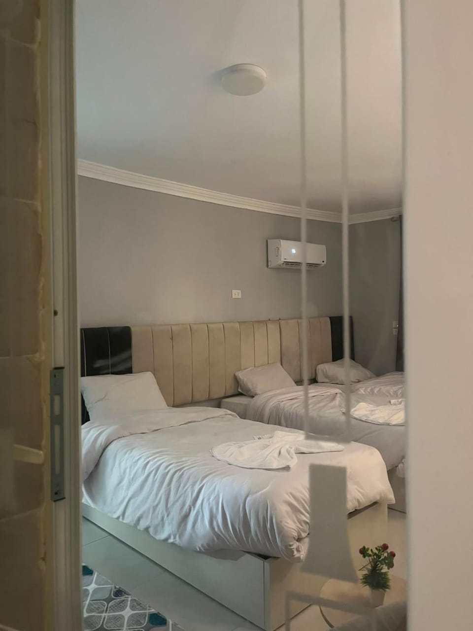 Bed, Photo of the whole room, Bedroom, towels, air conditioner