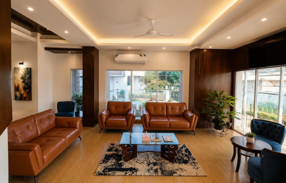 Communal lounge/ TV room, Lobby or reception, Seating area, air conditioner